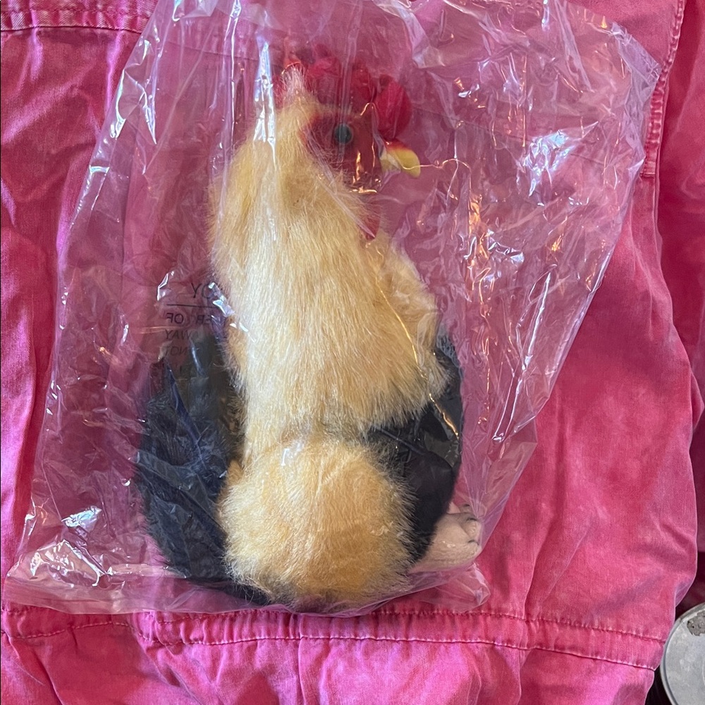 This is The Bearington Collection and the roosters name is Roy